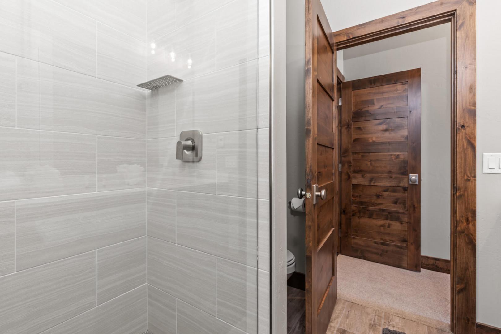 Modern shower with sleek glass enclosure, a perfect oasis for relaxation.