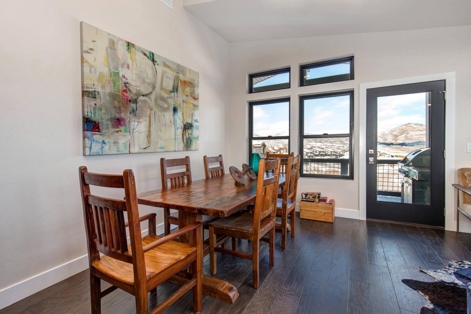 Dining table: "Sunlit space with a view, perfect for family meals and gatherings."