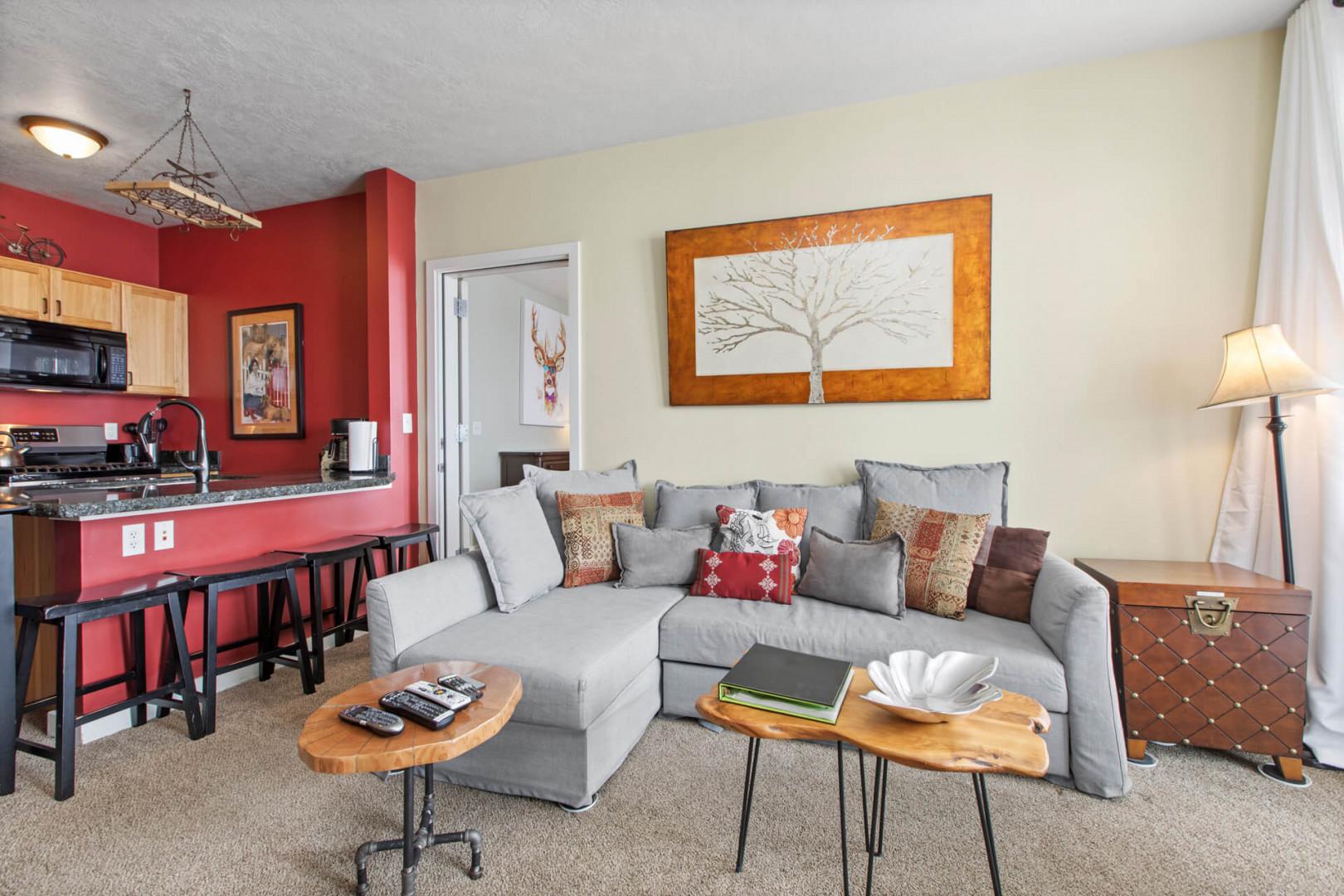 Cozy sofa set with stylish bar stools for a modern touch.