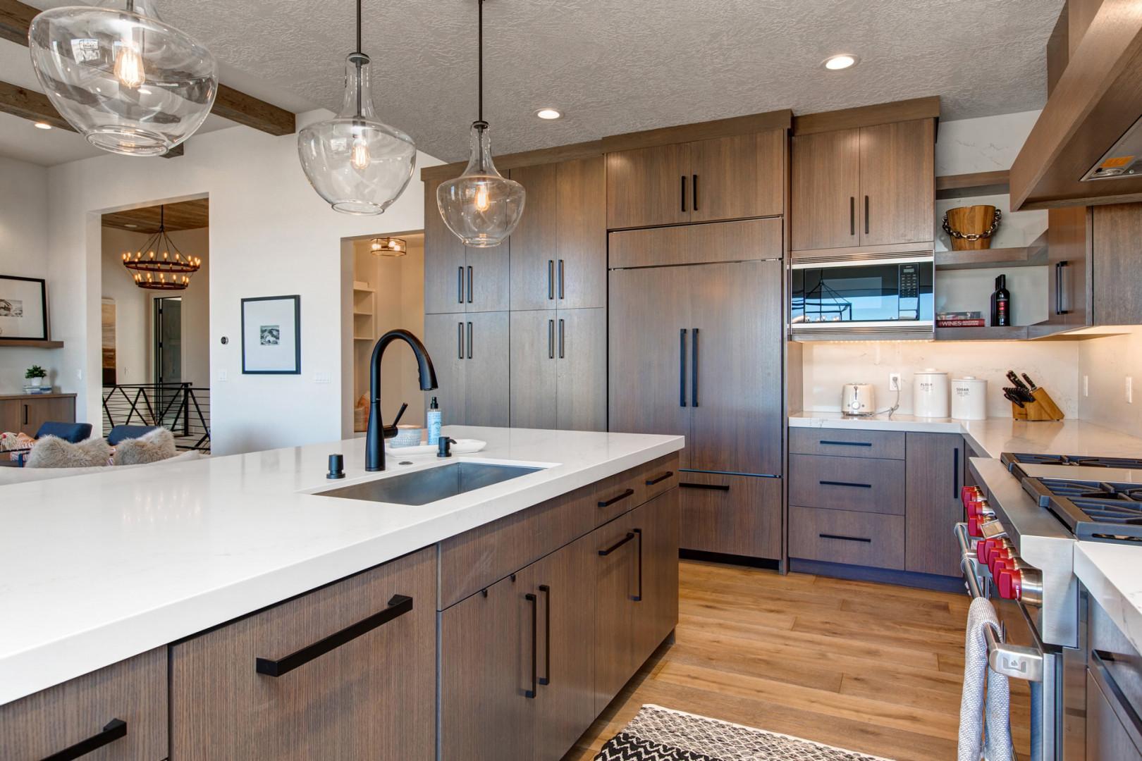 Jordanelle Estates 13201: Sparkling clean kitchen sink in a spacious, well-lit cooking area.