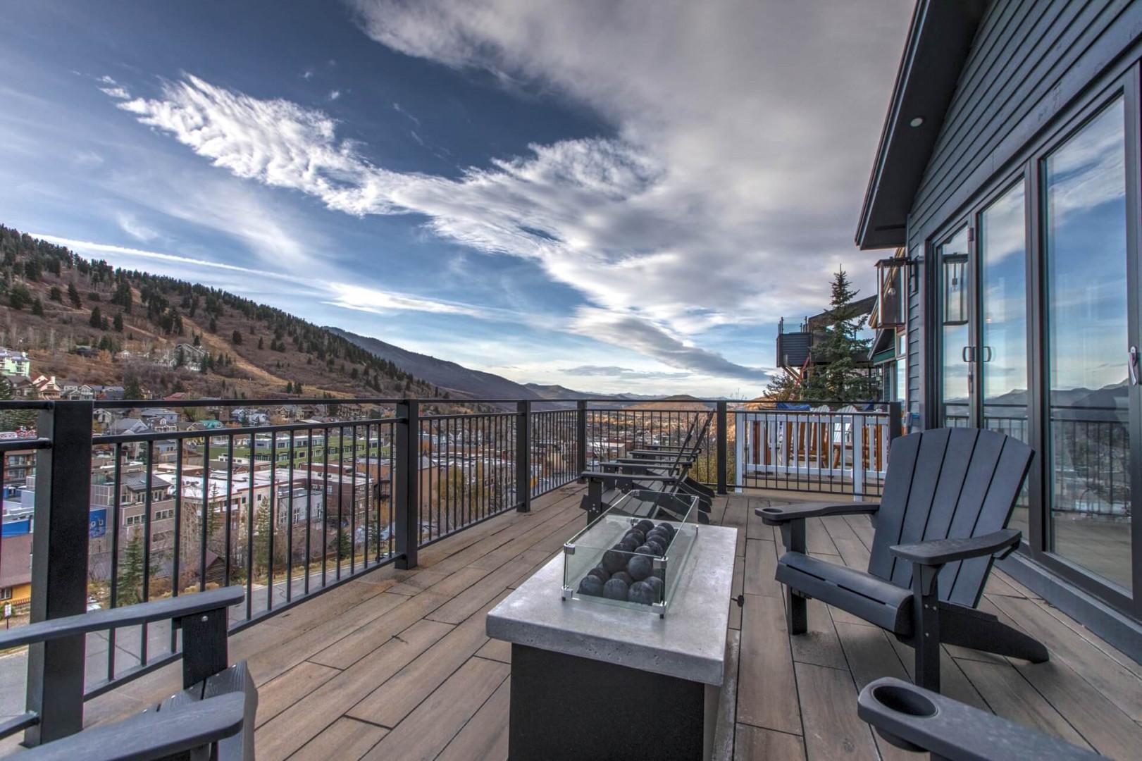 Outdoor Patio: "Cozy spot with mountain views, gas firepit, and comfy chairs.