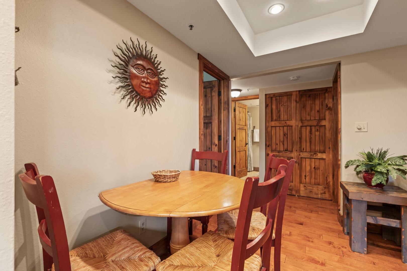 Powderwood 11C: Inviting dining table in a cozy kitchen setting.