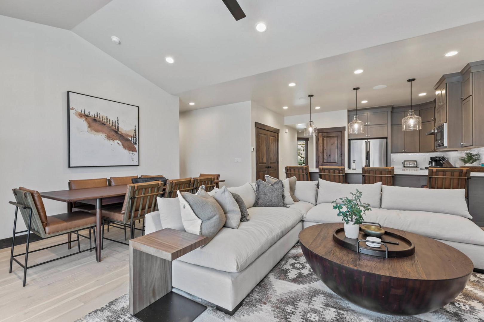 Black Rock Ridge 14488: Cozy sofa set, and dining table, with a glimpse of the kitchen.