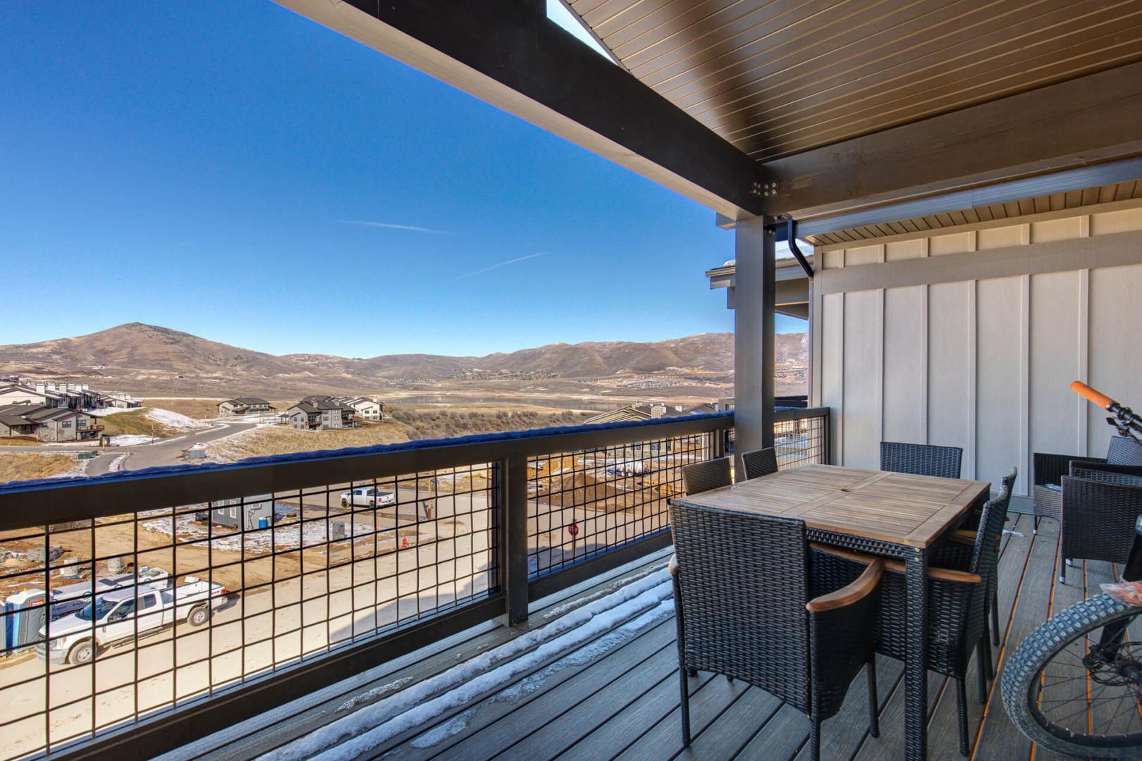 Outdoor Patio: "Inviting space with table and chairs for al fresco dining."