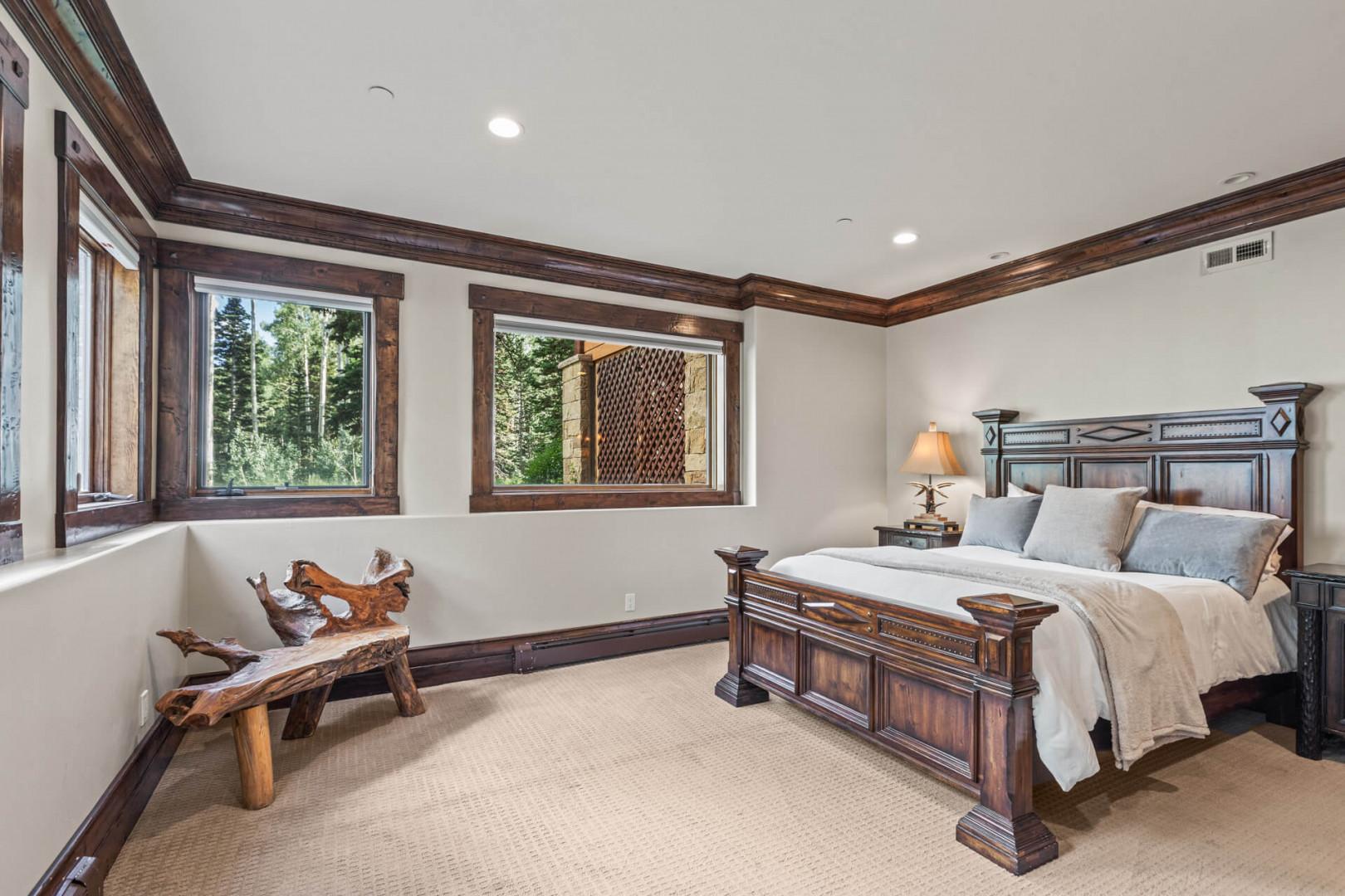 Queen bed, multiple windows, perfect for a peaceful retreat.