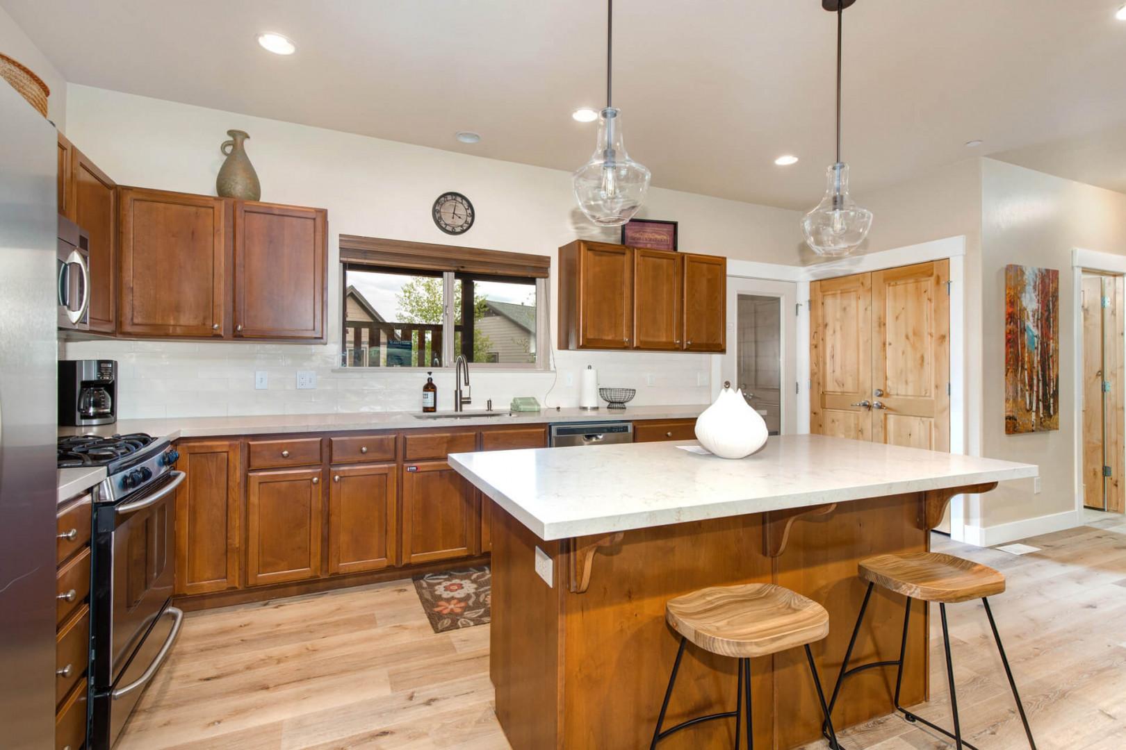 Bear Hollow Village 5610: "Sleek counter, modern cabinets, and stylish bar stools in this kitchen.