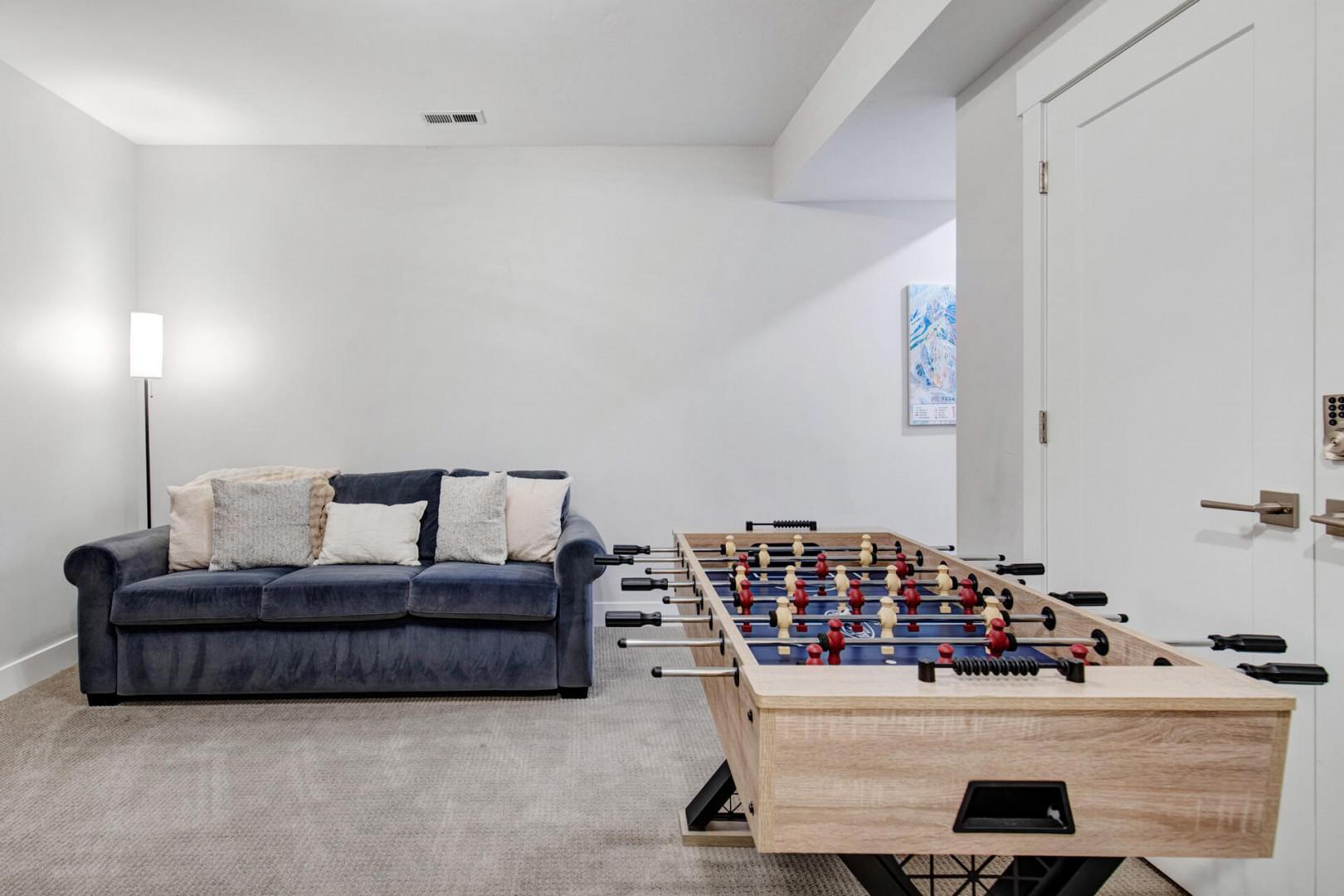 Your private game room awaits—kick back on the cozy sofa after an intense foosball match, or challenge your travel companions to a friendly tournament in this quiet, inviting space.