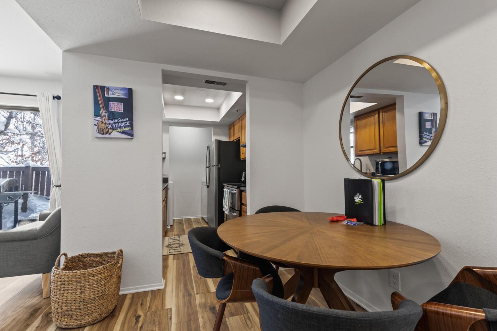 Powderwood 12N: Inviting dining table in a cozy kitchen setting.