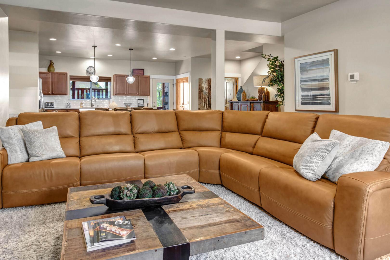 Sink into this luxurious leather sectional where you can unwind after your adventures, with the gourmet kitchen just steps away for evening snacks.