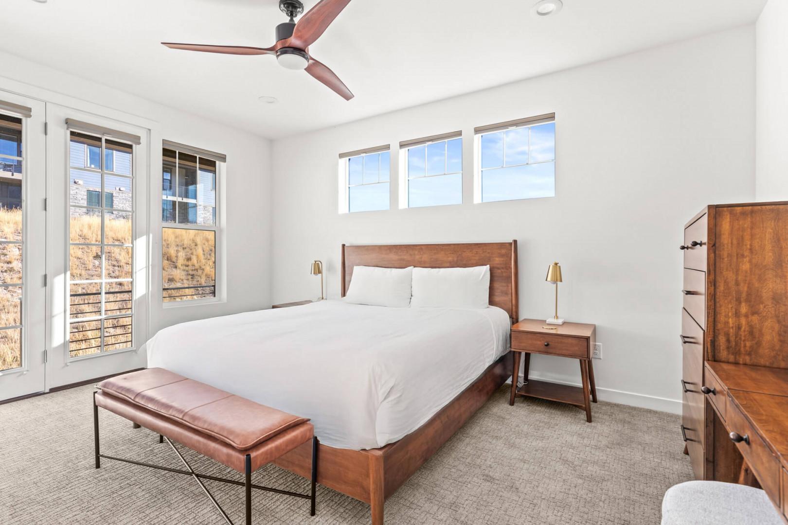 Slip into crisp linens and drift off to the gentle rhythm of the ceiling fan above. Soft morning light filters through your windows, inviting peaceful mountain mornings and restful nights.