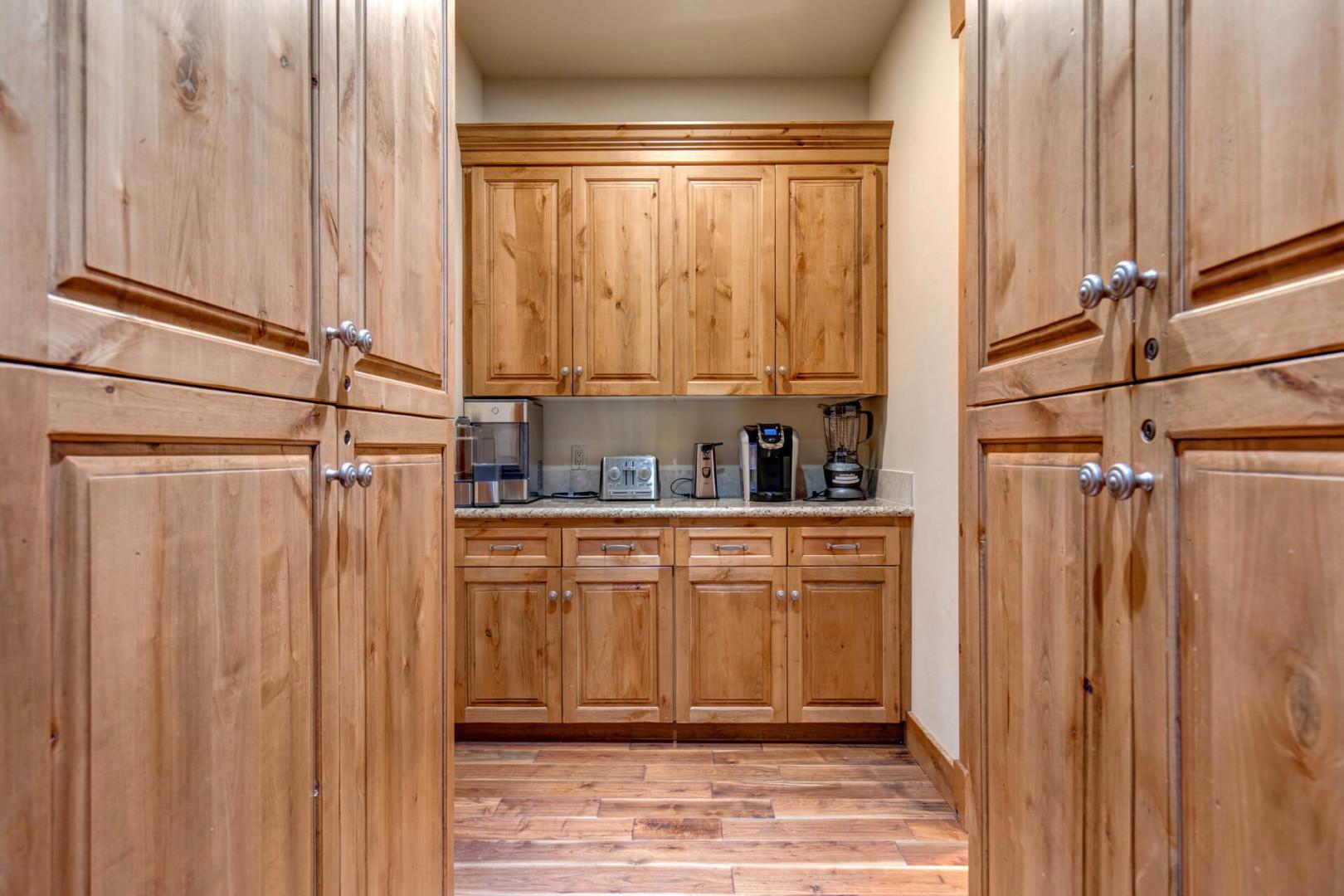 Sleek cabinets and modern appliances in this cozy kitchen space.