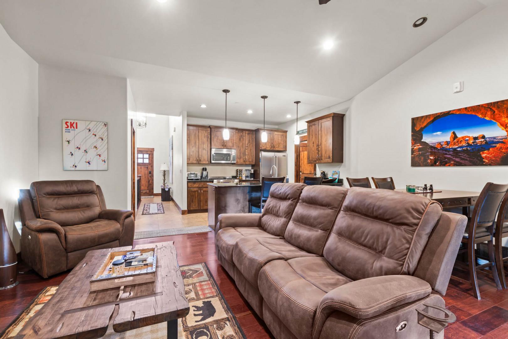 Relax on plush seating in your open-concept main level living space, where mountain views and ski memories blend perfectly with modern comfort.