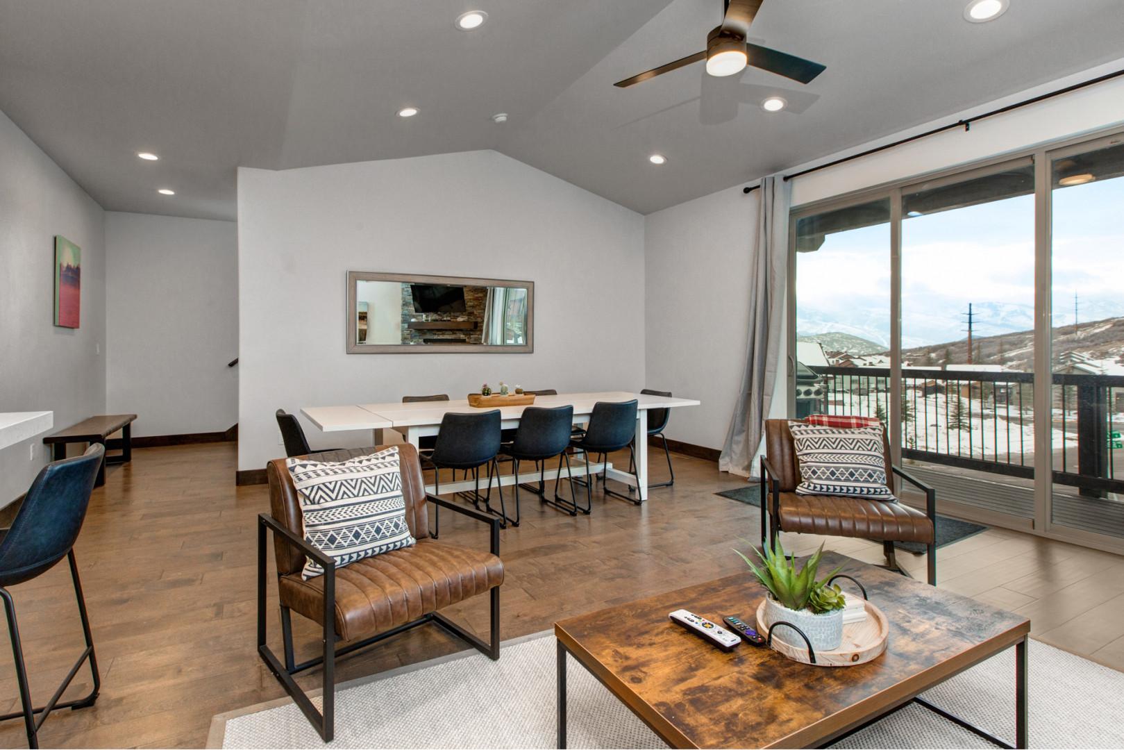 Black Rock Ridge 14494: Cozy sofa set, elegant dining table, and inviting outdoor patio space