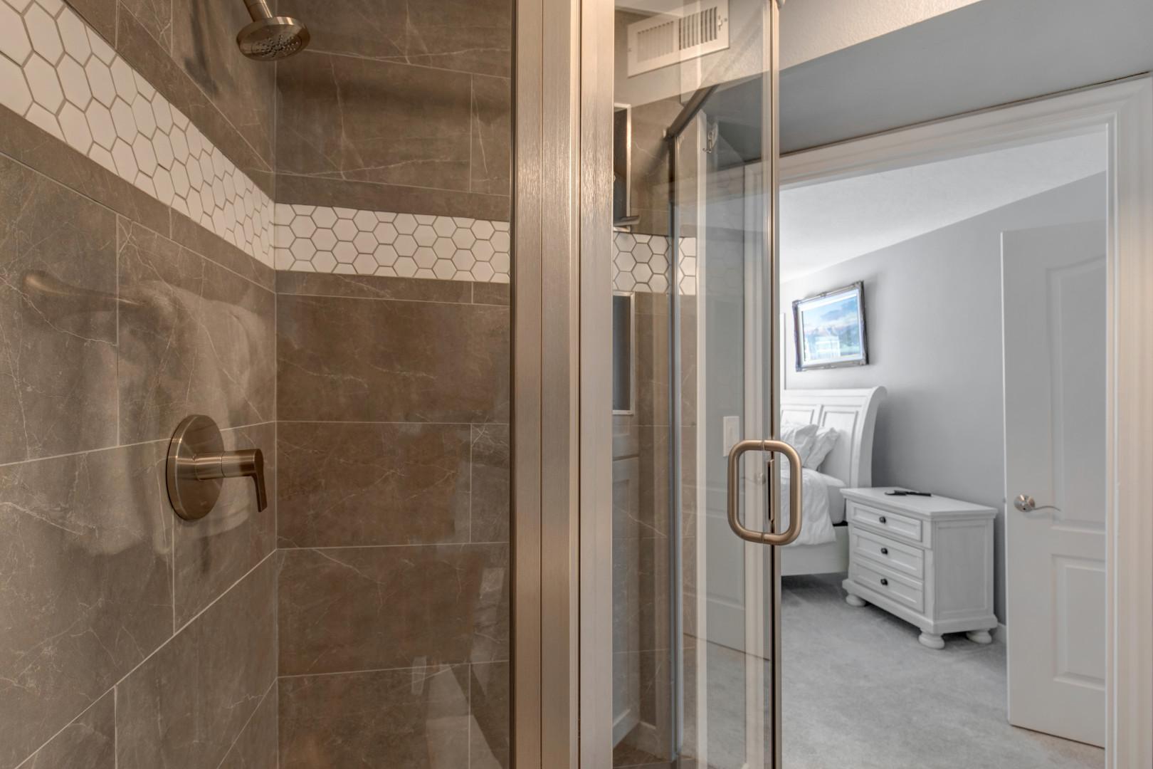 Fox Bay H101: Modern shower with sleek glass enclosure, a perfect oasis for relaxation.