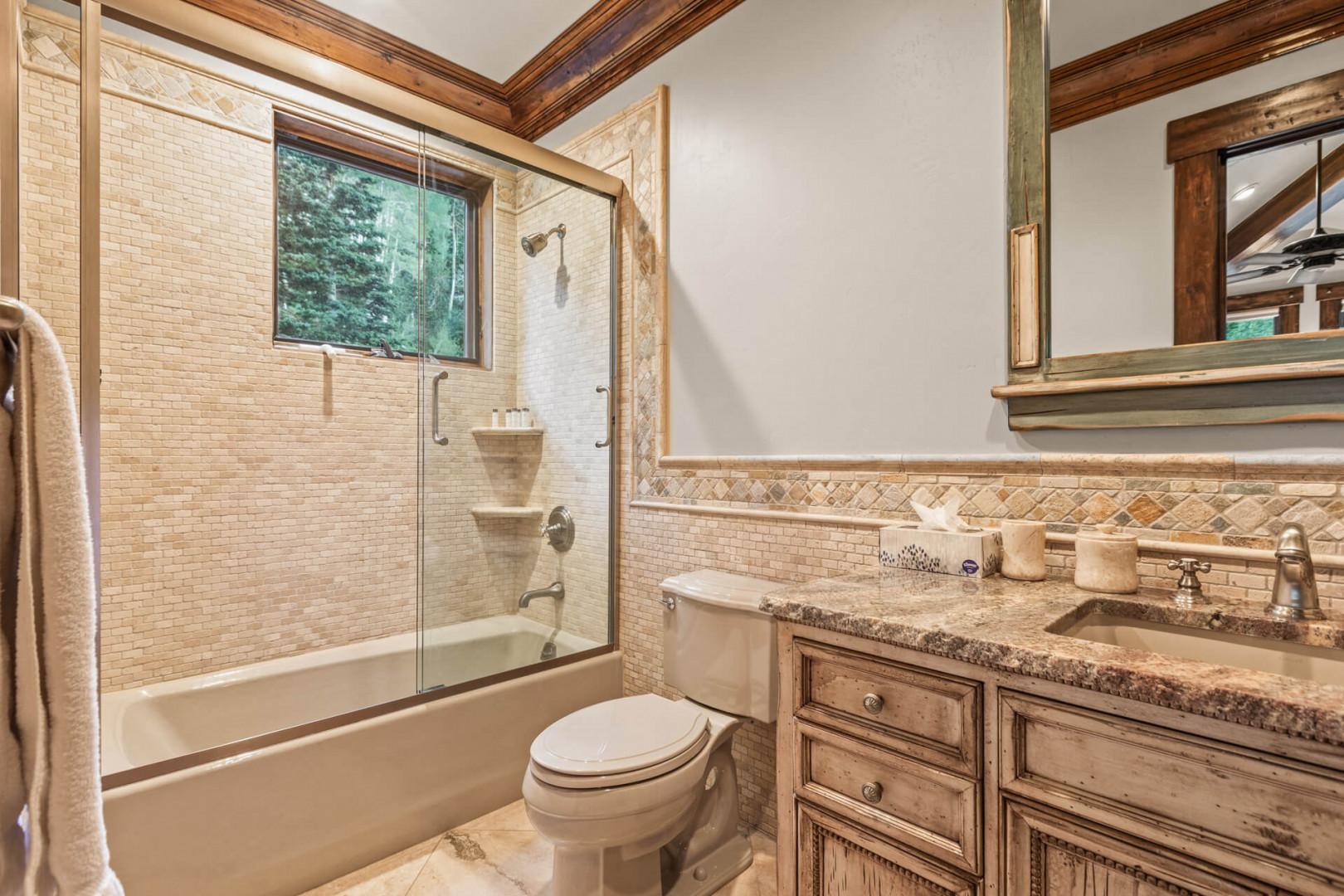 Relaxing soak awaits in this convenient tub shower combo.