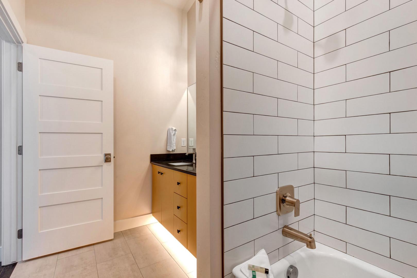 Relaxing soak awaits in this convenient tub shower combo.