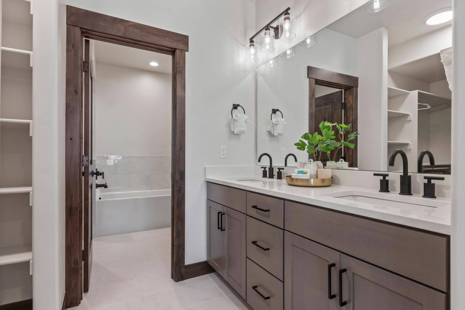 Black Rock Ridge 14488: Reflective sink area with a sleek mirror, perfect for morning routines.