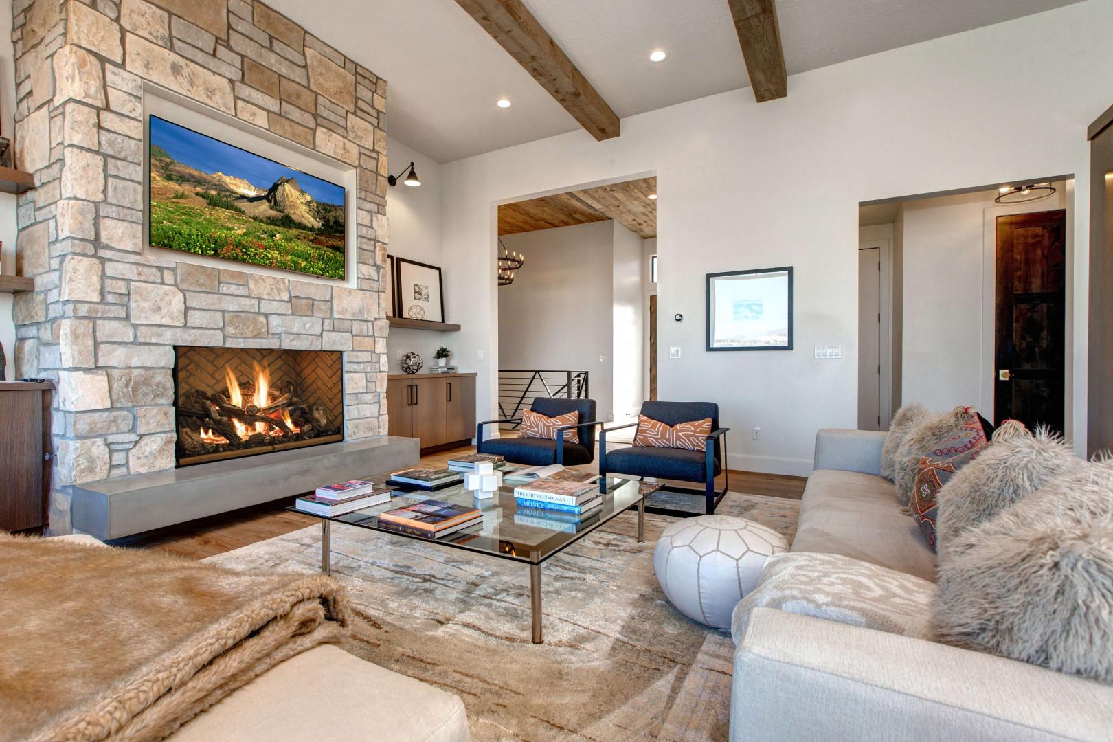 Jordanelle Estates 13201: Living Room: "Cozy space with a fireplace, TV, and stylish sofa set."