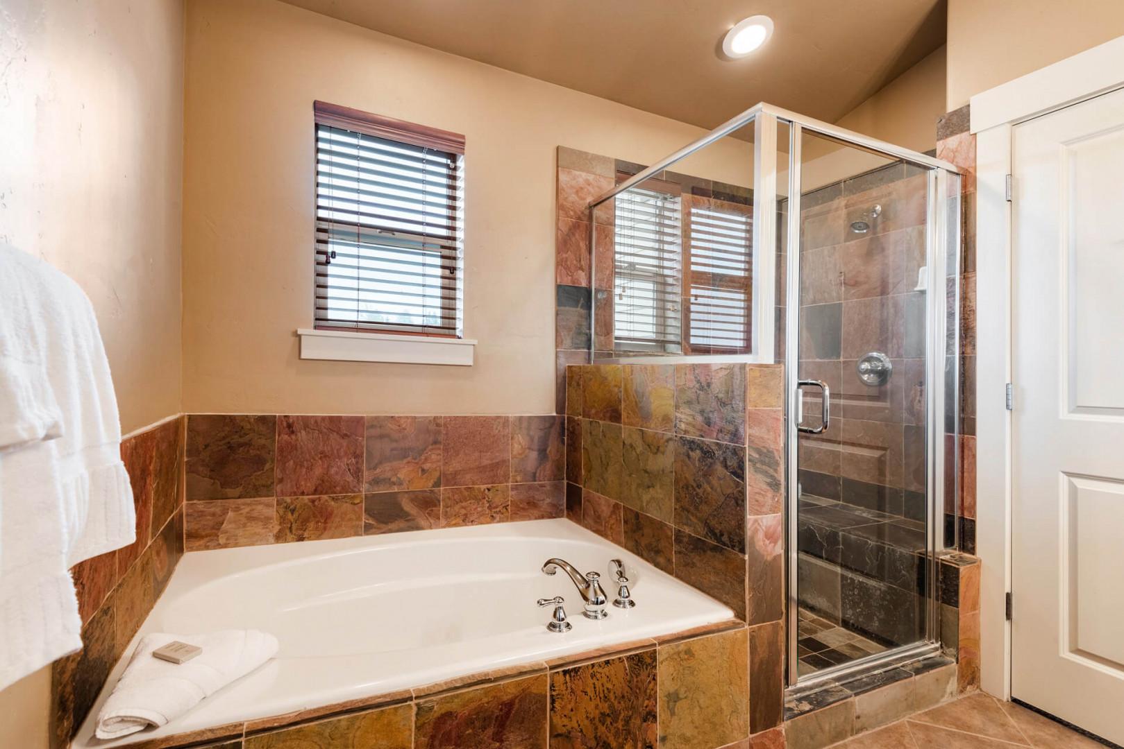 Bear Hollow 5557: Serene retreat with a luxurious bath tub and spacious shower area.