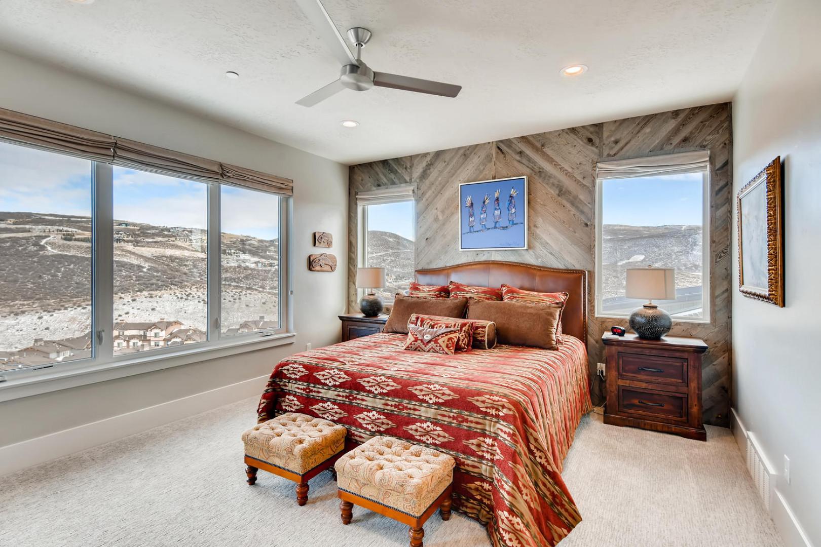 Jordanelle Estates 13299: Bedroom "Sunlight streaming through cozy bed by the windows, perfect morning."