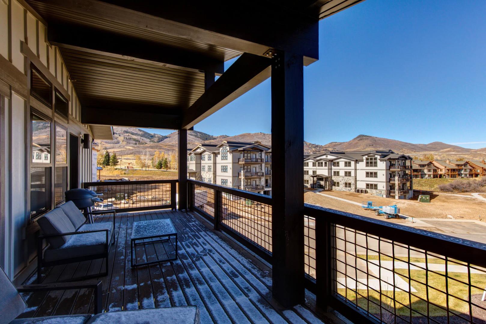 Mayflower Lakeside 301-45: Outdoor Patio: "Inviting space with cozy table and chairs for al fresco dining."