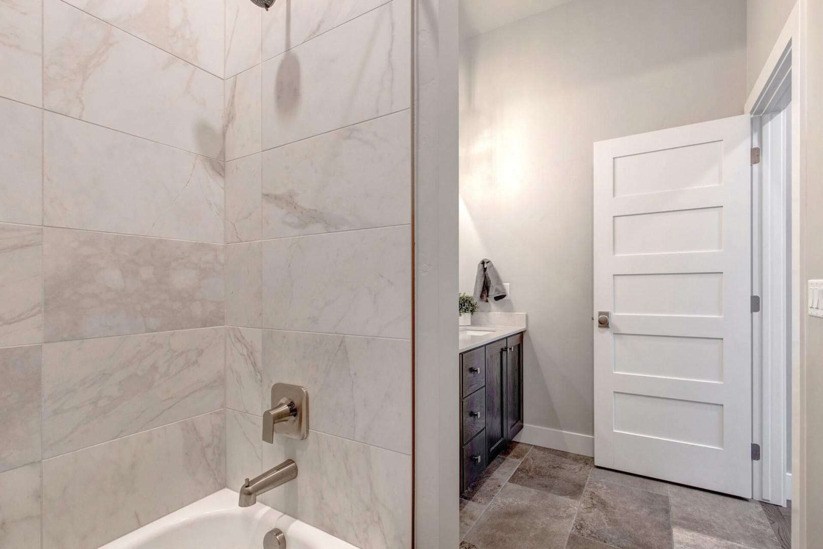 Relaxing soak awaits in this convenient tub shower combo.