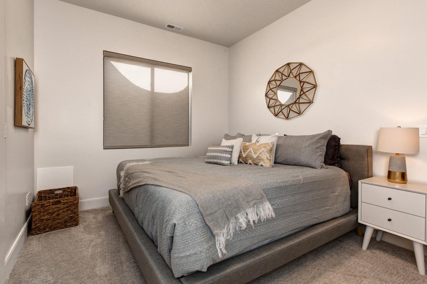 Jordanelle Estates 13201: Cozy bed by the window, perfect spot for relaxation and daydreaming.