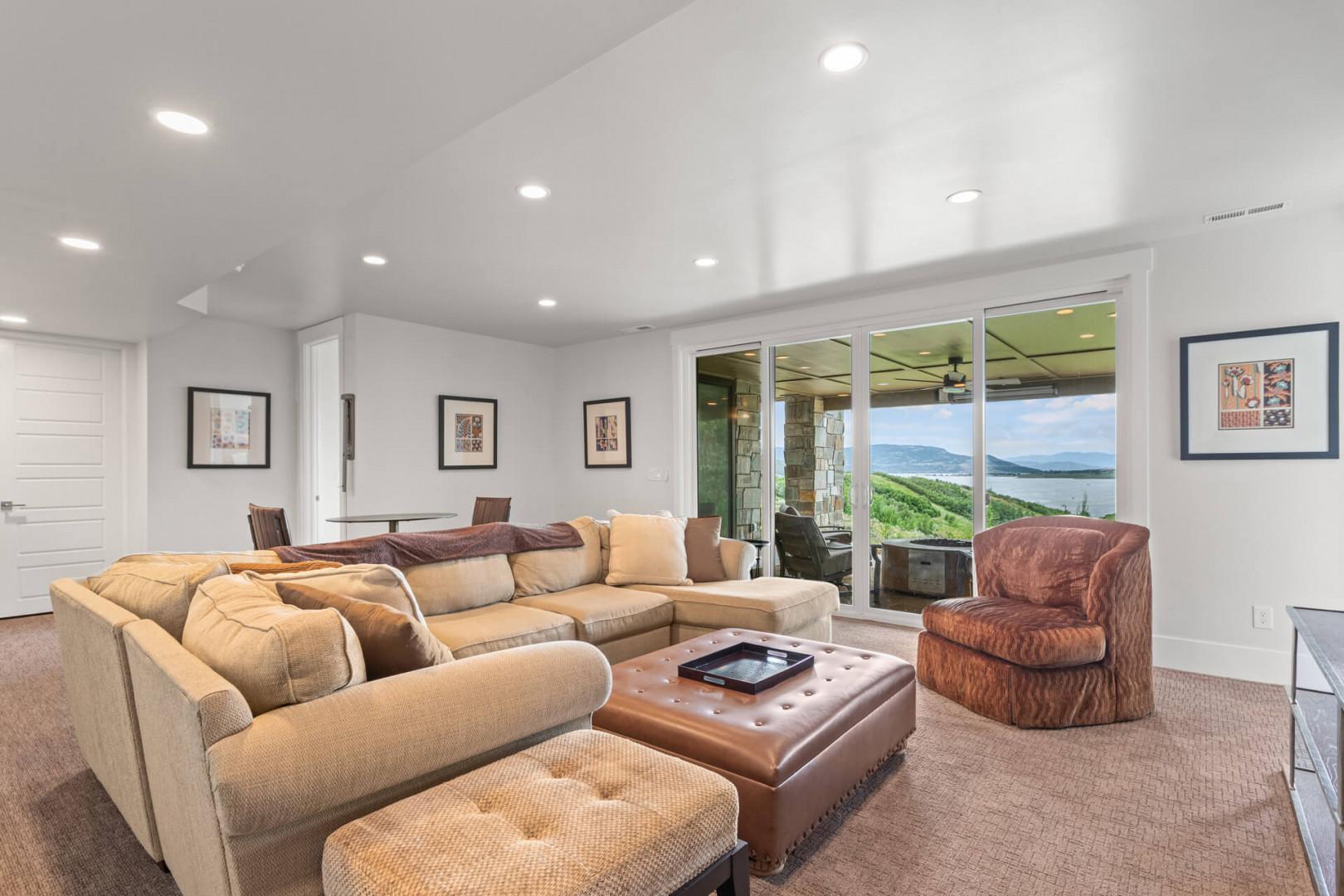 Deer Springs 12797 Summer: Cozy sofa set by sliding door to outdoor patio view.