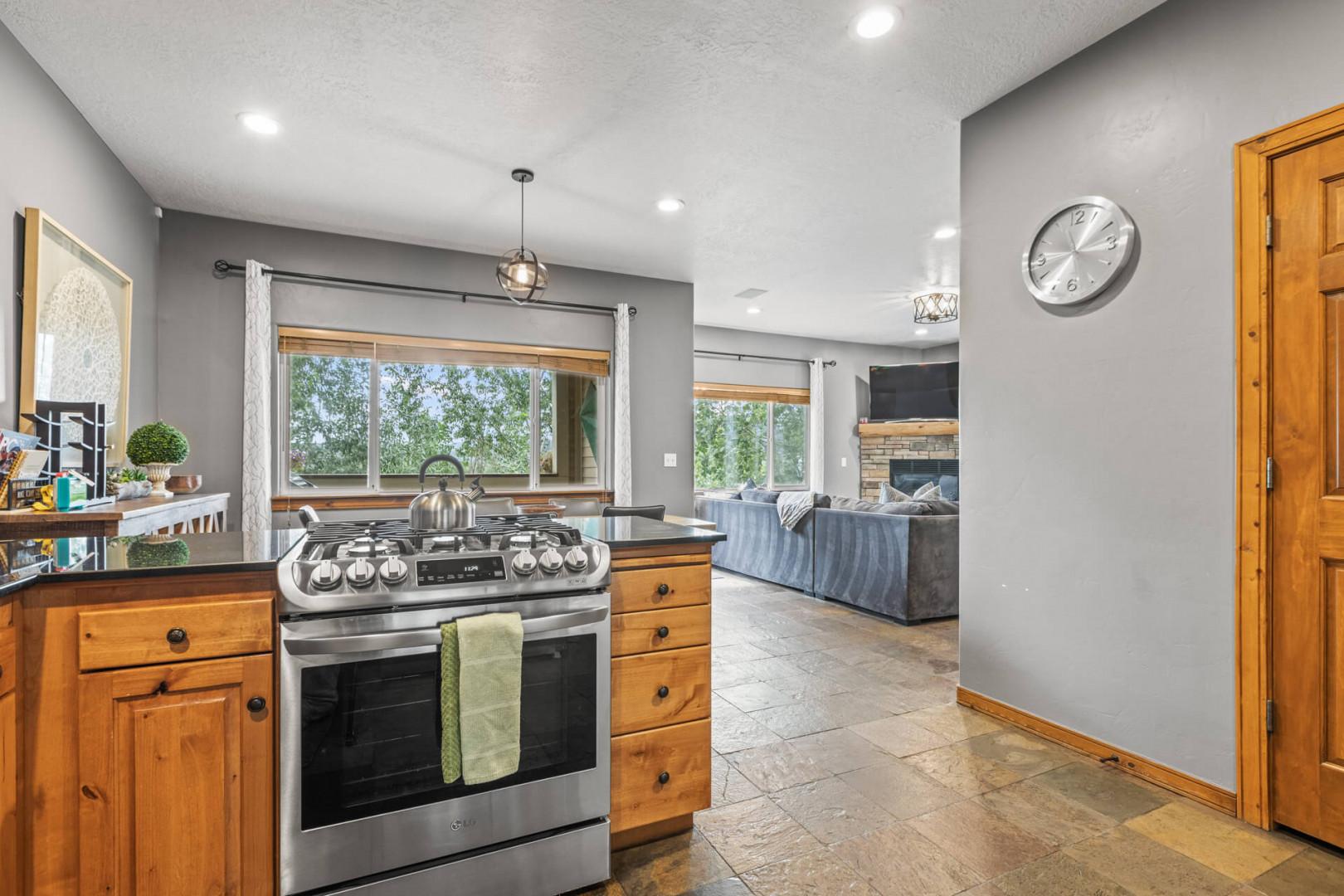 Bear Hollow Village 5458: Sleek gas range adding modern charm to the culinary space.