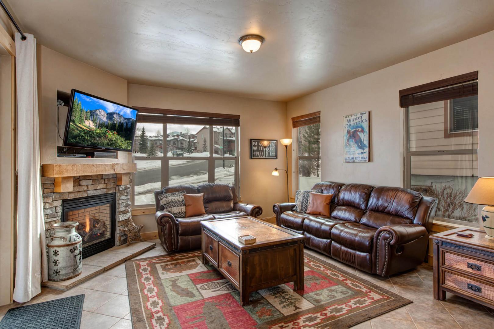 Bear Hollow 5557: Living Room: "Cozy setup with fireplace, overlooking outdoor patio through the window."