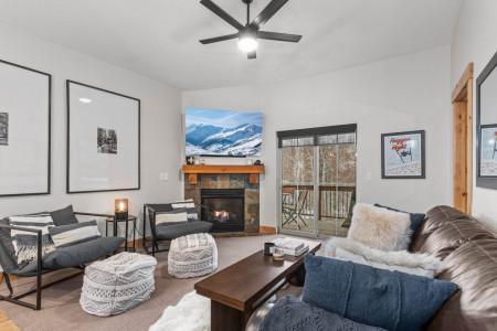 Vacation Rentals in Park City at Bear Hollow Lodges 3401: Living room with gas fireplace and private balcony access