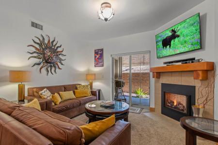 Vacation Rentals in Park City at Bear Hollow Lodges 4205 Living room with gas fireplace and patio access