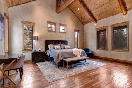 Bedroom "Cozy bed nook with natural light, perfect for work and relaxation.