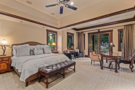 Vacation Rentals in Park City at White Pine 129: Primary bedroom with King bed, ensuite bathroom, and office area