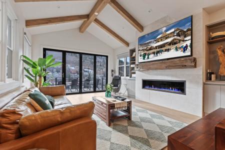Vacation Rentals in Park City at Upper Main 237: Cozy sofa for three by the gas fireplace and TV