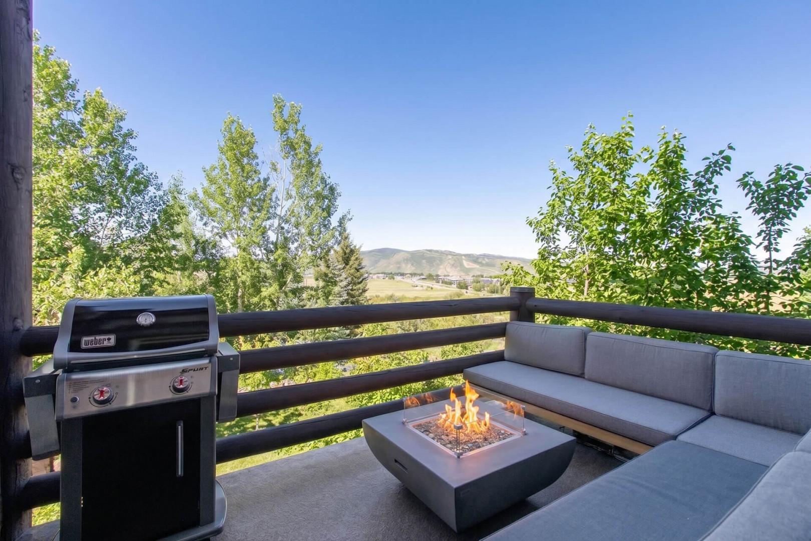 Bear Hollow Village 5534: Main level balcony with seating, natural gas firepit, grill and bar table seating