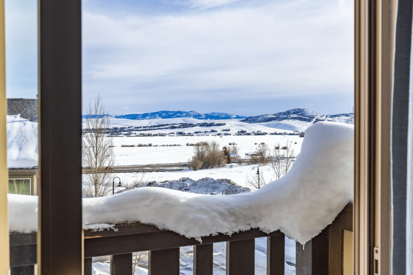 Wake up to breathtaking mountain views blanketed in pristine snow, framed perfectly by your private balcony.