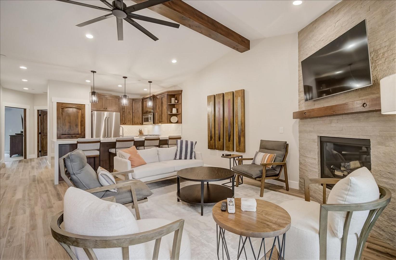 Black Rock Ridge 14202: Cozy sofa set, and bar table, with a glimpse of the kitchen.