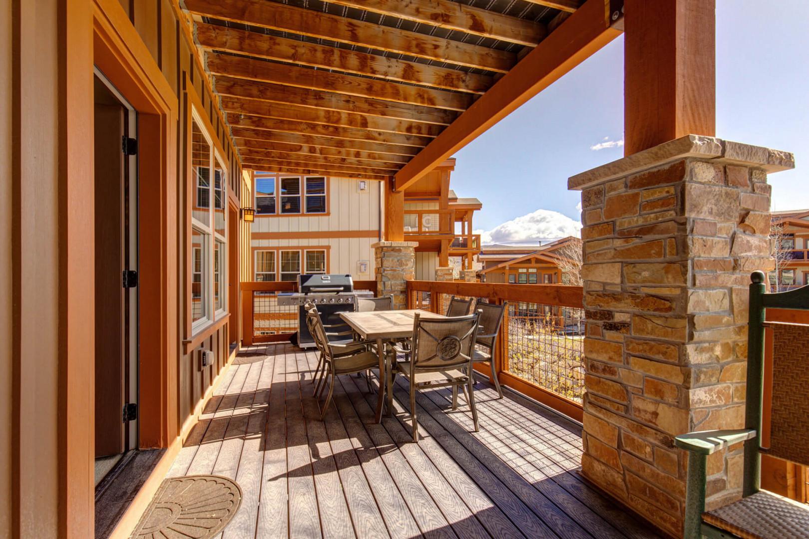 Village at the Shores 201: Deck/balcony with BBQ and dining area