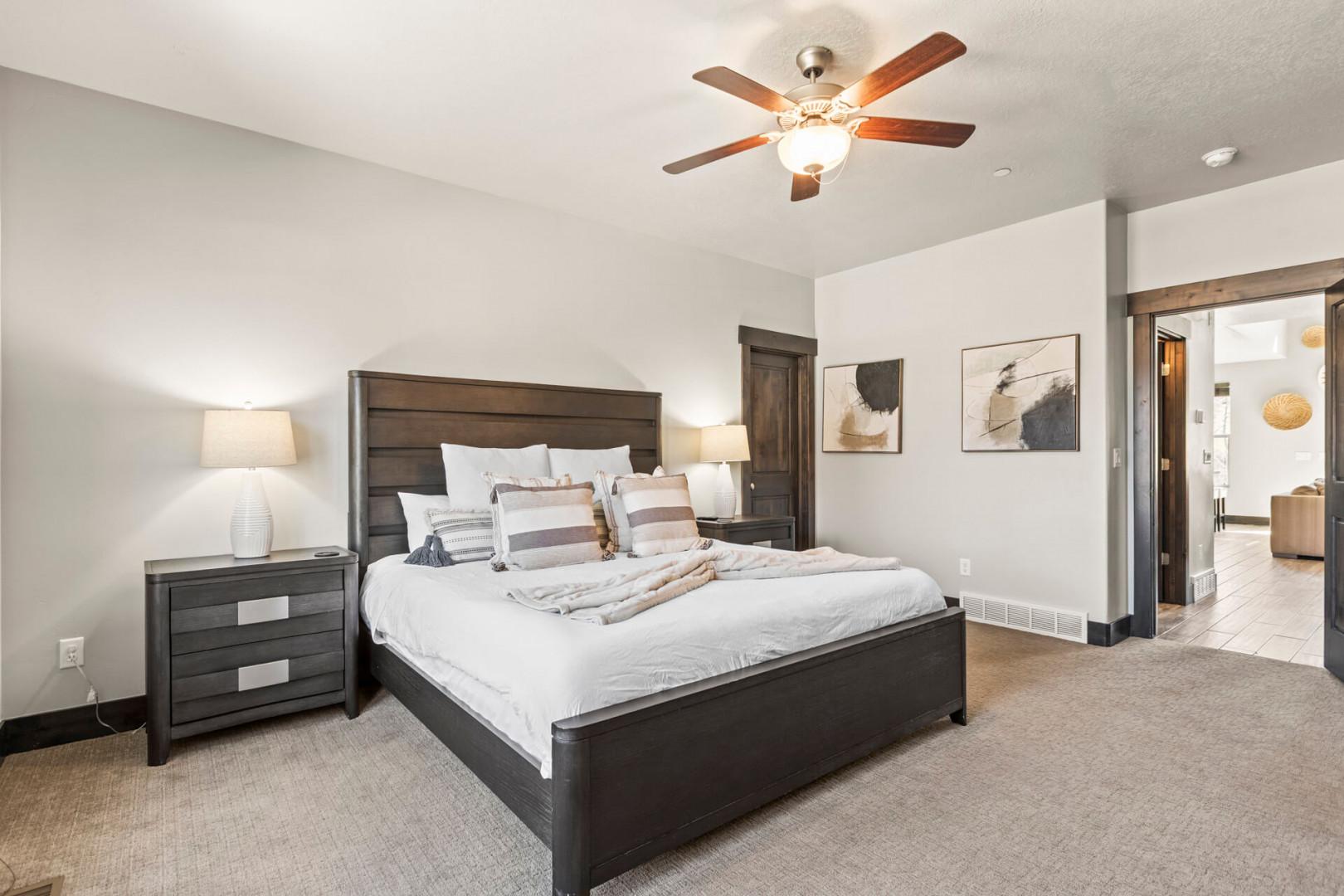 Your spacious bedroom features a comfortable king bed, elegant furnishings, and soft lighting for the perfect night's rest.