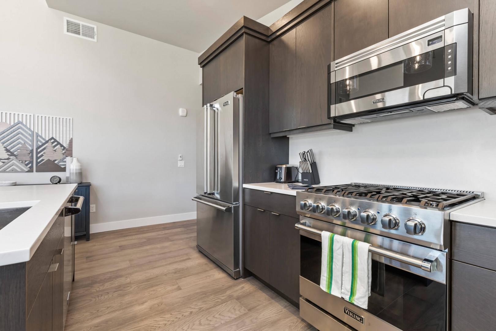 Mayflower Lakeside 301-45: Kitchen: "Sleek countertops and modern appliances make cooking a breeze."