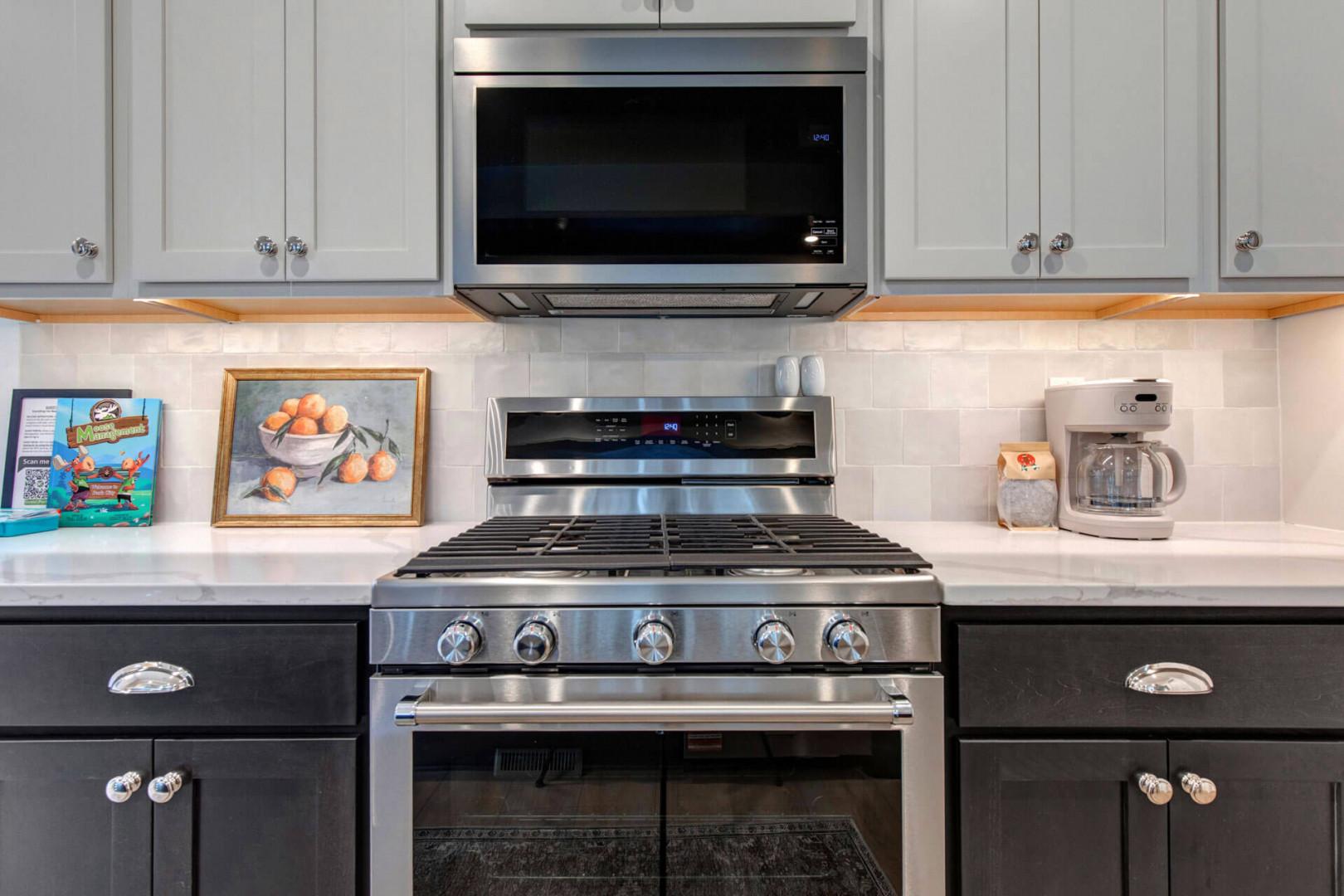 Your chef-quality kitchen features premium stainless steel appliances and beautiful white quartz counters perfect for preparing memorable meals.