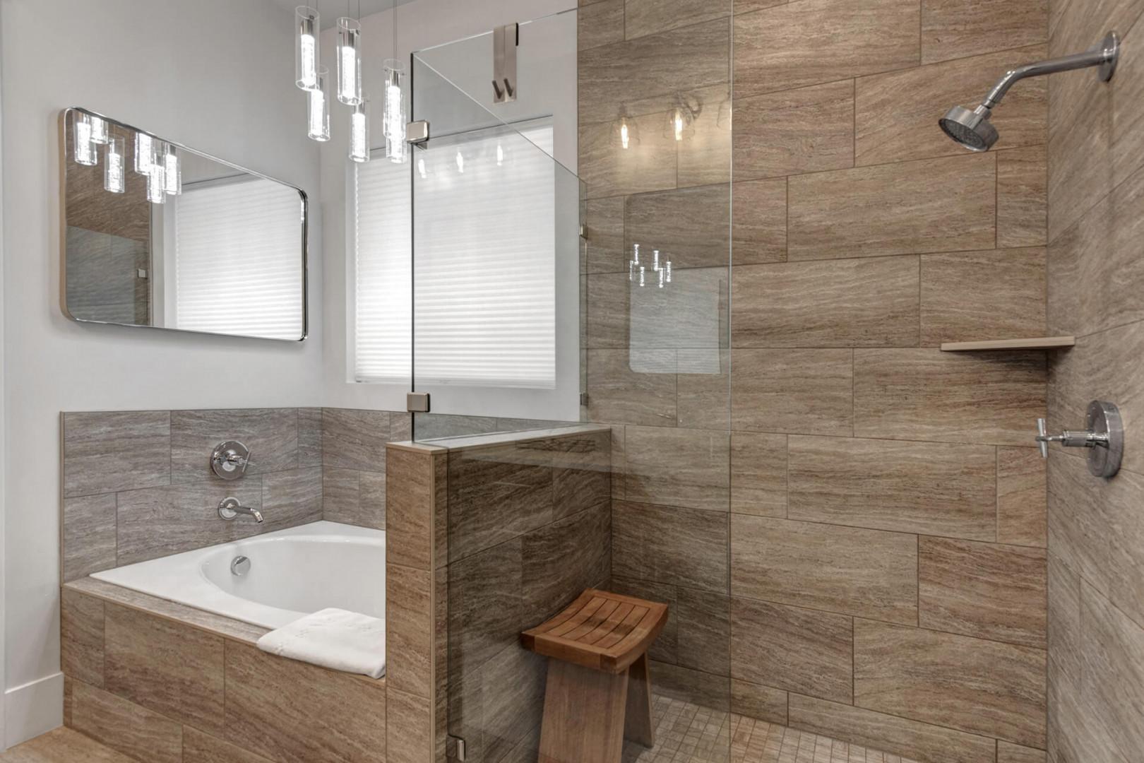 Deer Springs 12797: The primary has an exquisite ENSUITE BATHROOM with a glass-enclosed shower, a soaking tub.