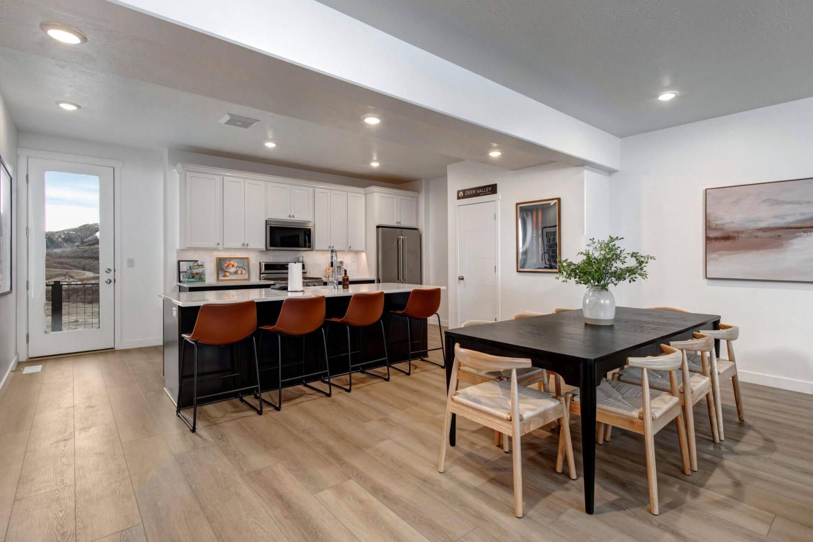 Your modern kitchen flows seamlessly into dining space, perfect for gathering with loved ones over home-cooked meals and morning coffee.