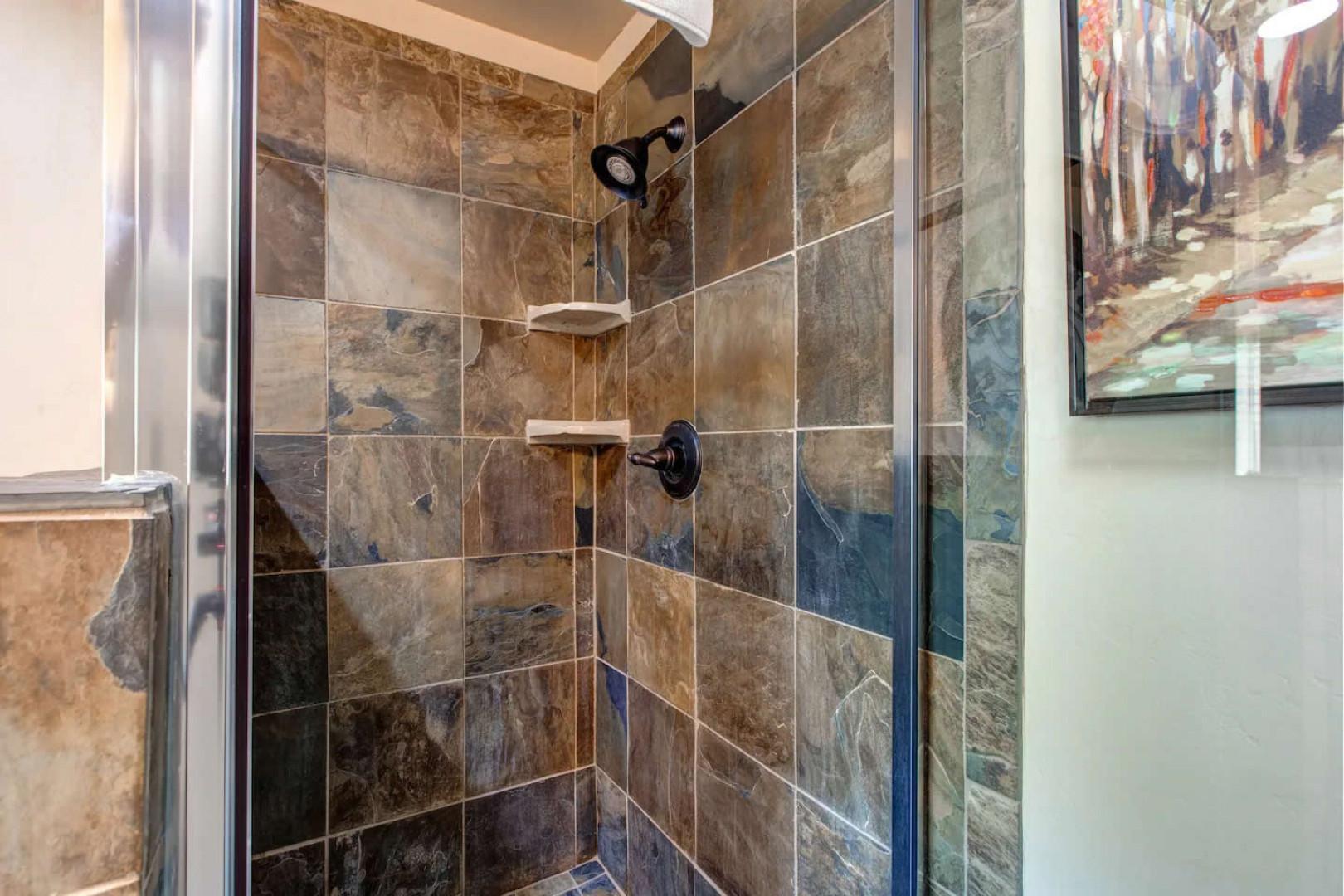 Bear Hollow 1404: Sleek and modern shower area, perfect for a relaxing rinse.