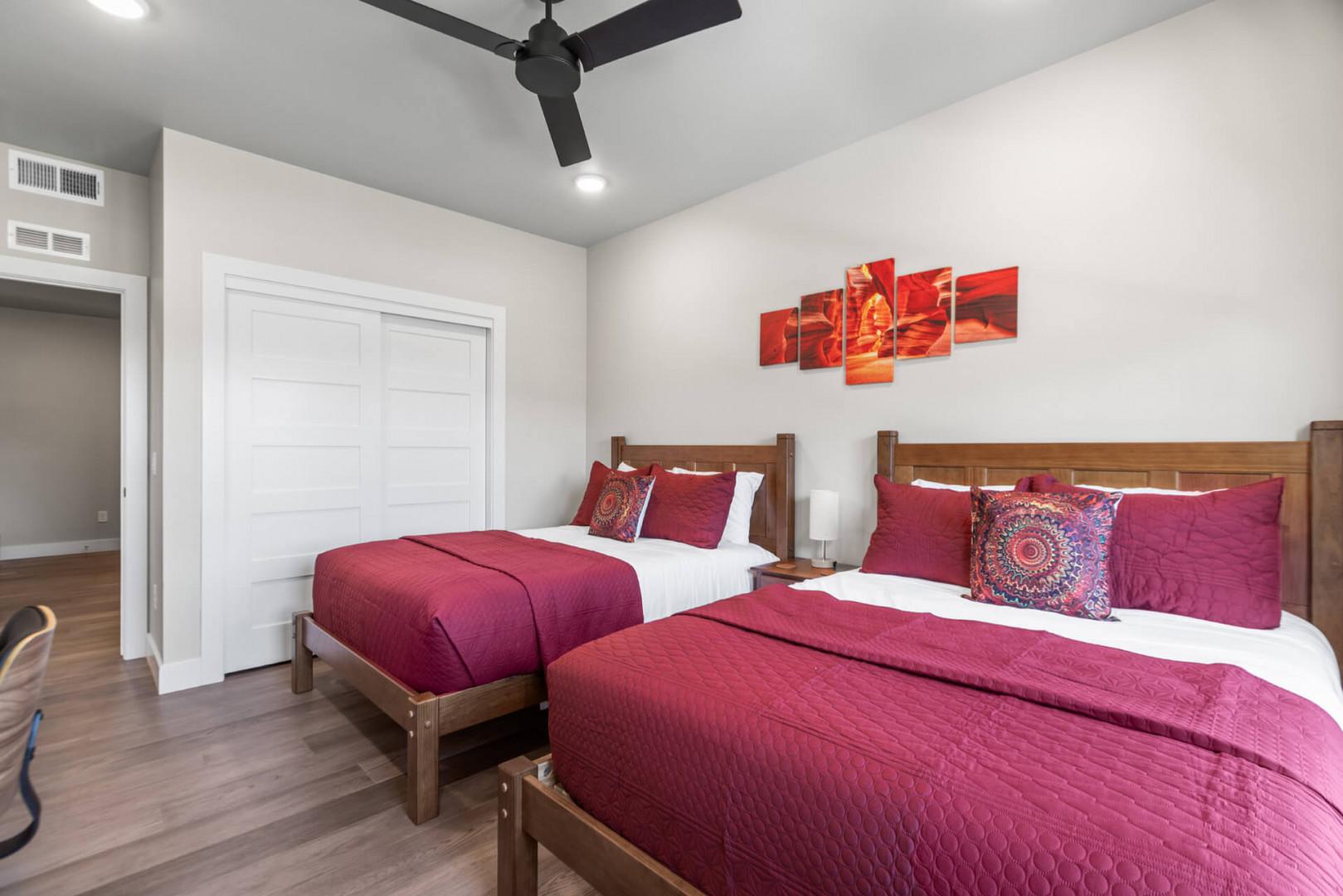 Sink into plush bedding in your peaceful twin bedroom, where rich tones and modern comfort set the stage for restful nights and easy mornings.