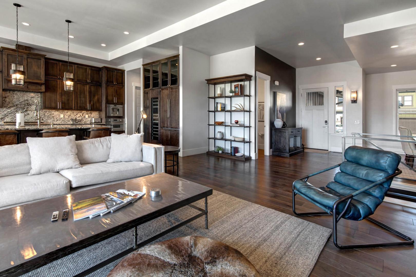 Deer Springs 12797: Open-concept living space that seamlessly connects the front entry way, living room, kitchen, and dining areas.