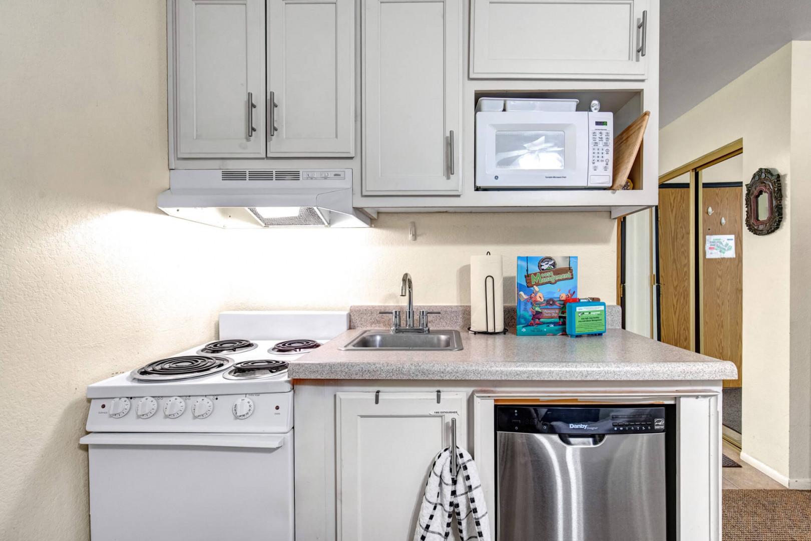 Your fully equipped kitchen has everything you need to prepare meals, from stove and microwave to dishwasher, making it easy to feel at home during your stay.