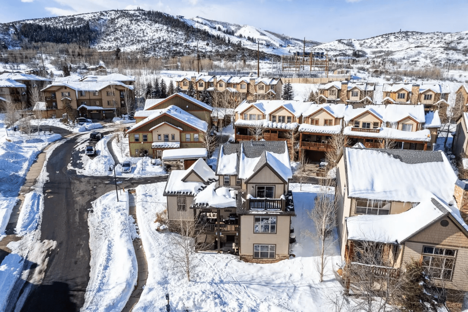 Charming mountain village neighborhood nestled in snowy peaks, offering convenient access to winter recreation and alpine adventures.