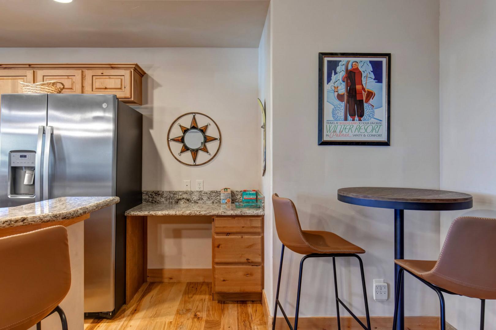 Your fully equipped kitchen features granite counters, stainless appliances, and a cozy breakfast nook perfect for morning coffee.